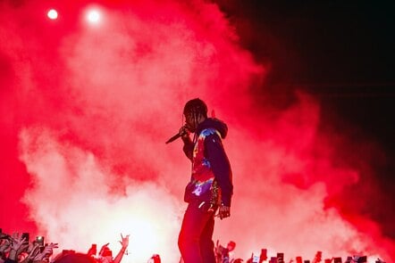 From Sunglasses To Sneakers: How Travis Scott Blends High Fashion And Streetwear