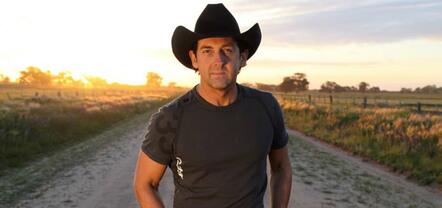 Australian Country Star Lee Kernaghan Performs On Virgin Australia Flight