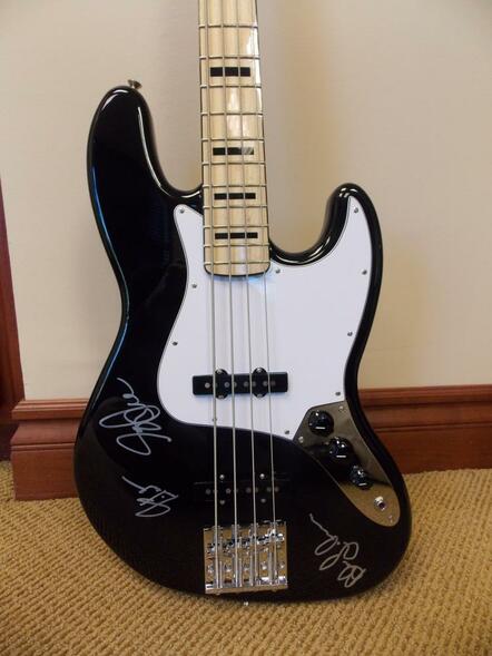 RUSH Autographed Bass Guitar To Be Displayed At The 2013 NAMM Show
