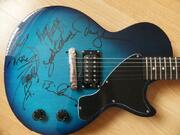 Thin Lizzy Autographed Bass And Guitar Auction For Childrens Charity